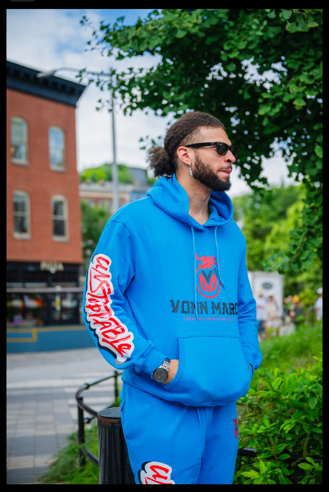 VONN MARC LIGHT BLUE HOODIE WITH RED & BLACK LOGO 2 pockets & 2 Zipper pockets-sweat pant as well …… $250.00 per set …