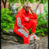 Red Flame VONN MARC Sweat suit sizes on model in vibrant red outfit, stylish urban setting.